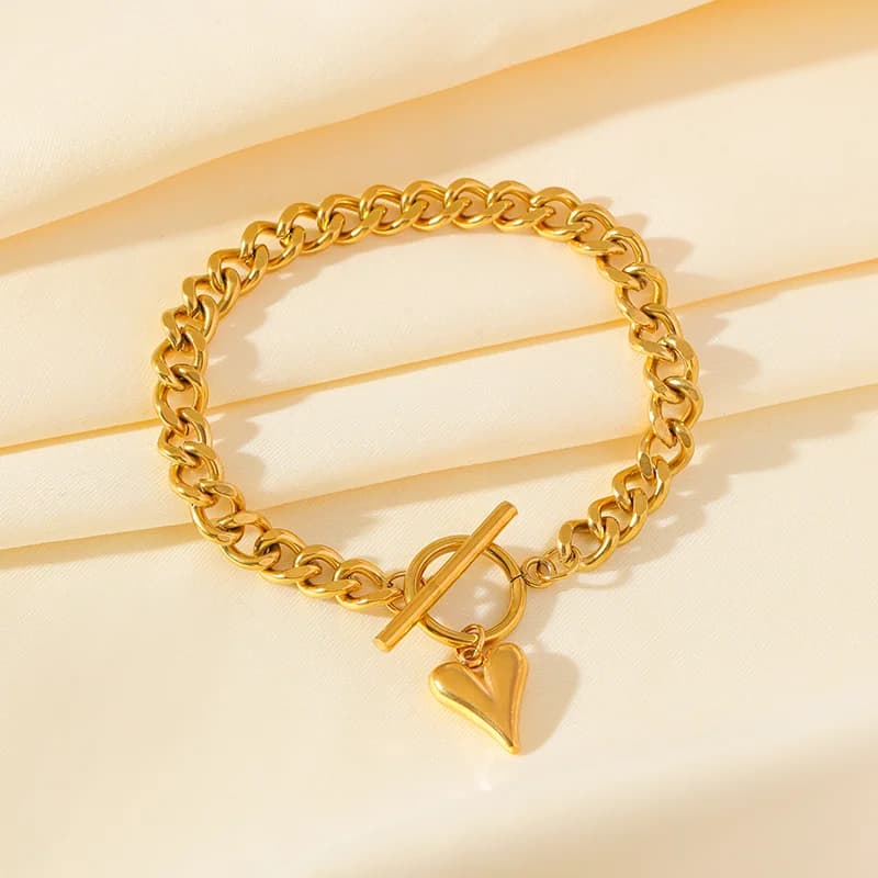 Bransoletka charms z sercem, pozłacana 18K